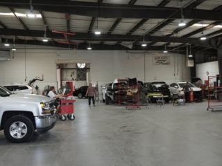 Our Facility state-of-the-art-equipment-garage-technician-restoration-clean-fleet-auto-body-accident-repair-collision-center-vehicle-car-truck-suv-fleet-detailing-detail-metairie-kenner-new-orelans-louisiana