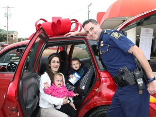 police-officer-recipient-children-benevolence-state-of-the-art-equipment-garage-technician-restoration-clean-fleet-auto-body-accident-repair-collision-center-vehicle-car-truck-suv-fleet-detailing-detail-metairie-kenner-new-orelans-louisiana